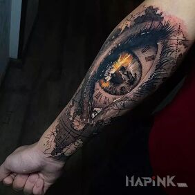 Tattoo Boy in the pupil on the forearm motif: black and gray style: realistic