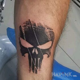 Tattoo Punisher on the forearm motif: black and gray style: graphic / illustrative