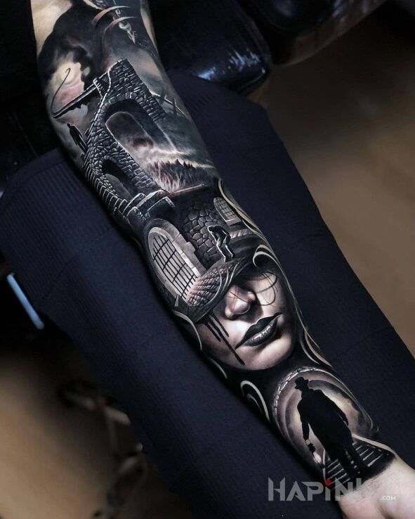 Tattoo Podróż w głąb siebie in dark motif and realistic style on the bicep