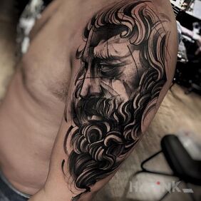 Tattoo Zeus on the upper arm motif: characters