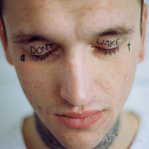 Tattoo Obudzony in lettering motif on the eyelids