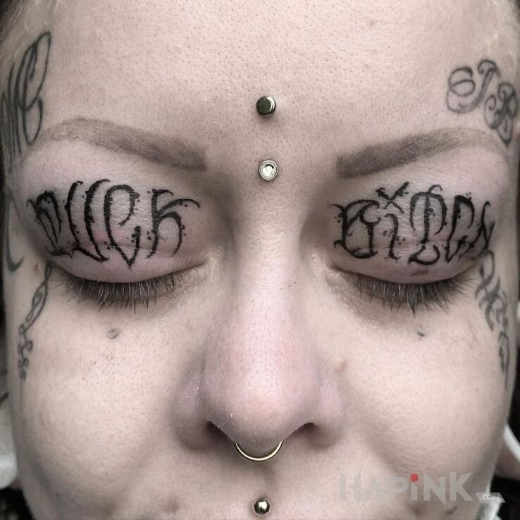 Tattoo Luck bitch? in lettering motif on the eyelids