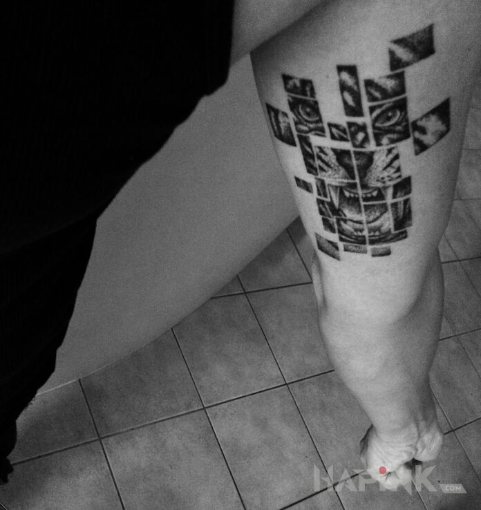 Tattoo Grafika Kot by RDK Radosław Pagórek in animals motif on the upper arm