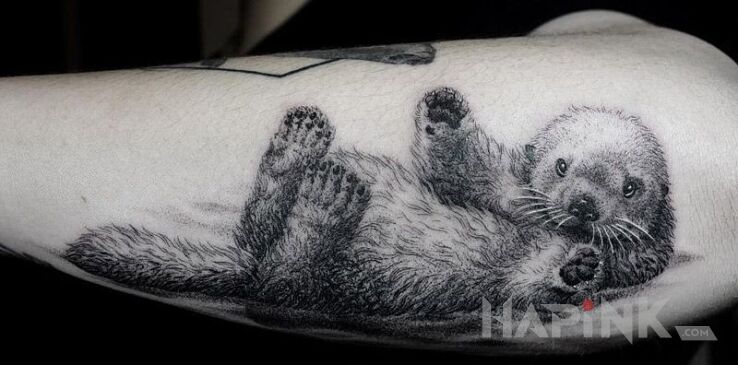 Tattoo Slodki zwierzaczek in animals motif on the forearm