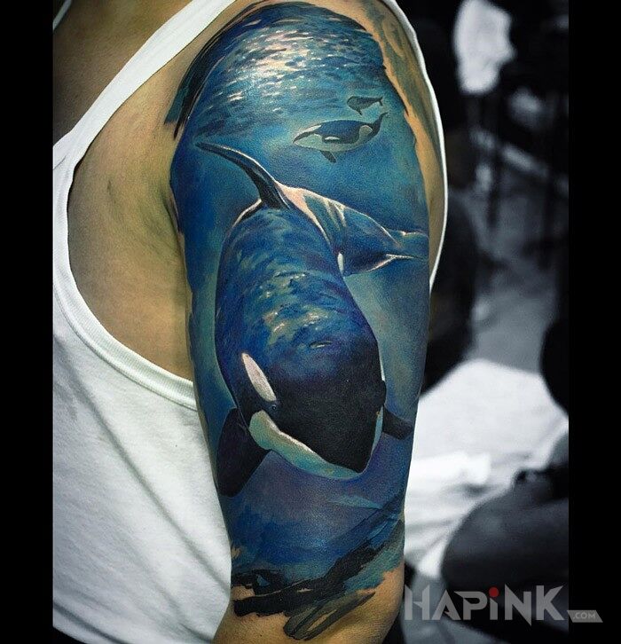 Tattoo Orka in 3D motif and realistic style on the upper arm