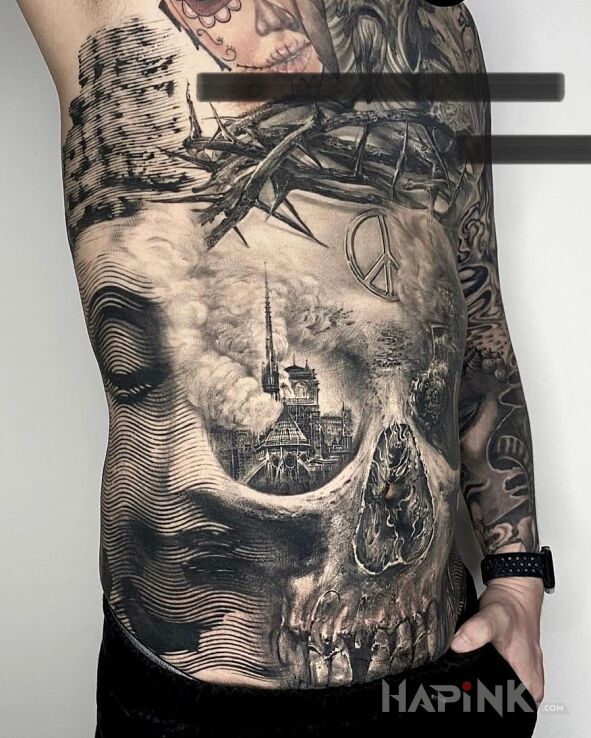 Tattoo Katedra płonie in black and gray motif and realistic style On the arm