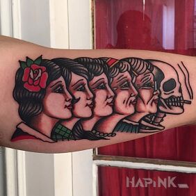 Tattoo The cycle of life and death on the upper arm motif: characters