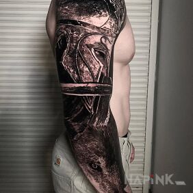Tattoo Wojak on a wolf On the arm motif: animals style: realistic