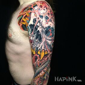 Tattoo Such a different skull On the arm motif: colorful style: graphic / illustrative