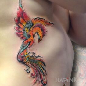 Tattoo Colorful phoenix on the ribs motif: animals