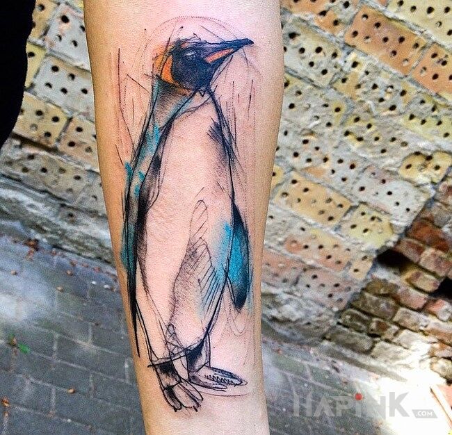 Tattoo Pingwin in animals motif on the forearm