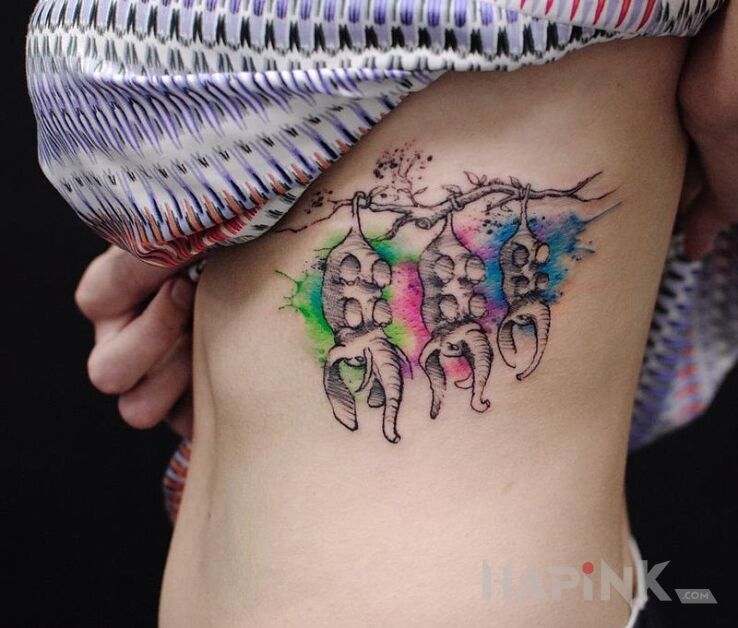 Tattoo Trzy słonie in animals motif on the ribs