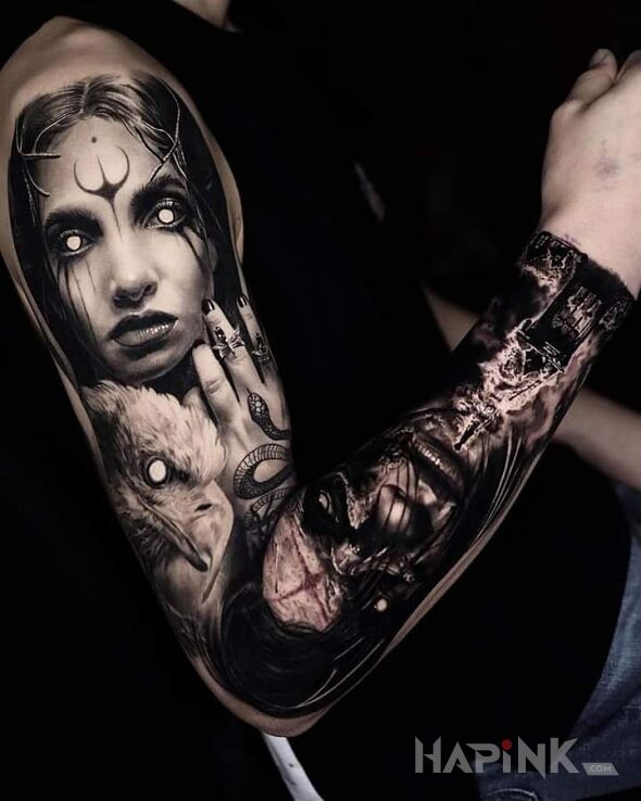 Tattoo Białe ślepia in black and gray motif and realistic style On the arm