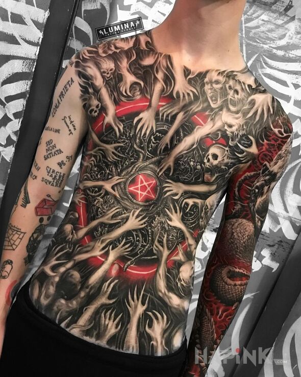 Tattoo Pentagram a dookoła pełno demonów in skulls motif and graphic / illustrative style on the upper arm