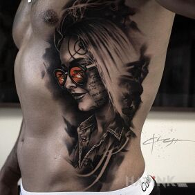 Tattoo Savannah in glasses on the ribs motif: faces style: realistic