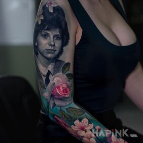 Tattoo Commemorative portrait On the arm motif: faces style: realistic