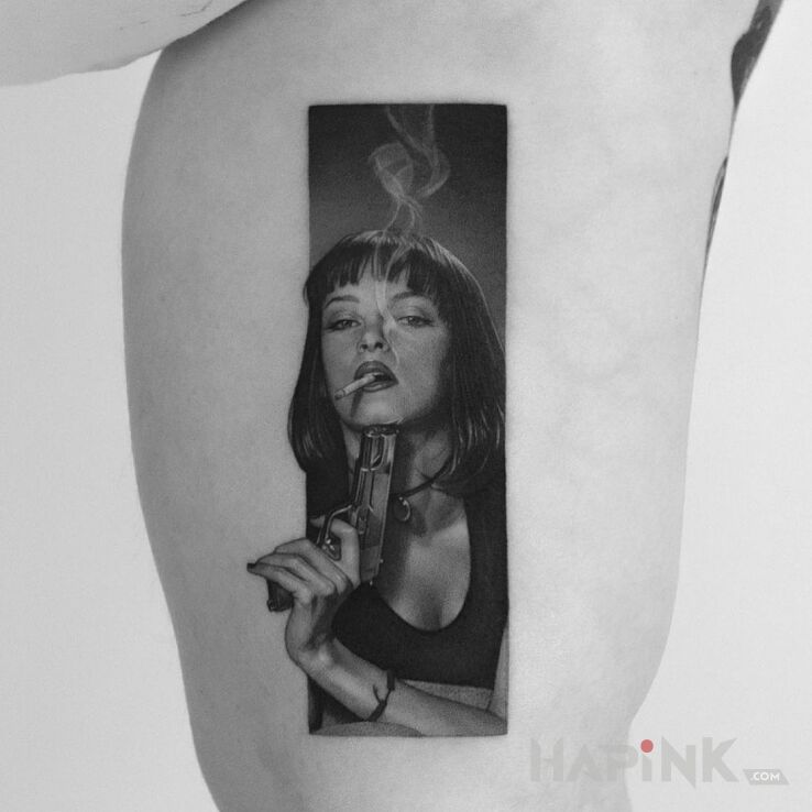 Tattoo Pulp Fiction in faces motif and realistic style On the arm