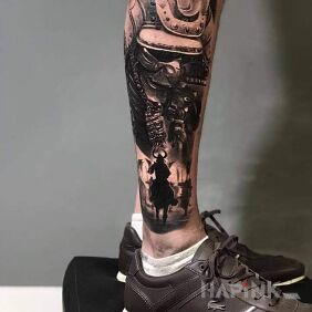 Tattoo Japanese on the calf motif: characters style: realistic
