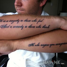 Tattoo Pretty font On the arm motif: lettering style: calligraphy