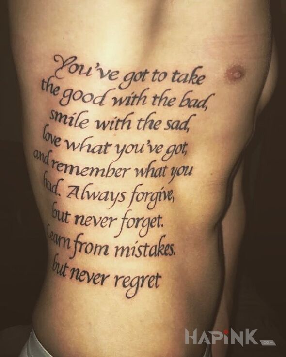 Tattoo Fragment z książki in lettering motif and calligraphy style on the ribs