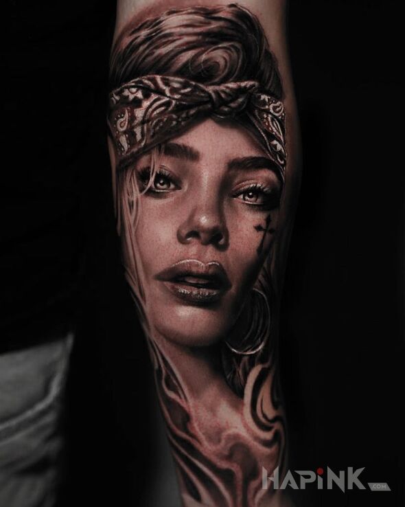 Tattoo Gangsta girl in black and gray motif and realistic style On the arm