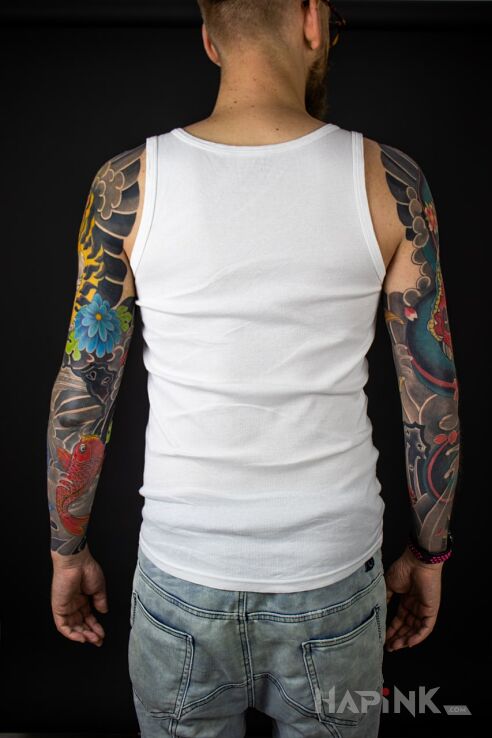 Tattoo JAPOŃSKI TATUAŻ in sleeves motif and japanese / irezumi style on the upper arm