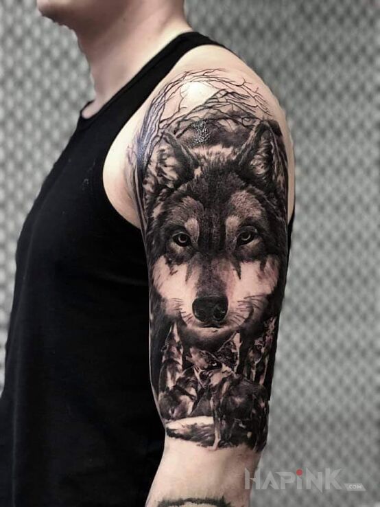Tattoo Wilk in black and gray motif and realistic style on the upper arm