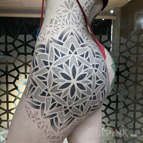 Tattoo Dotted as it should be on the thigh motif: black and gray style: dotwork
