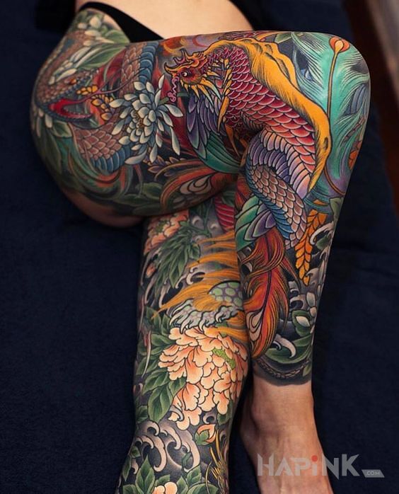Tattoo Nóżki kolorowe nóżki in flowers motif and japanese / irezumi style on the thigh