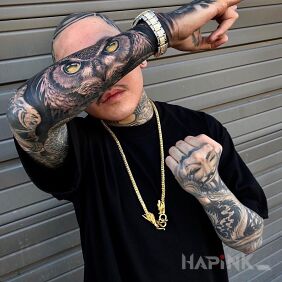 Tattoo Owl man on the hand motif: faces style: realistic