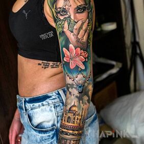 Tattoo Taj Mahal On the arm motif: faces style: realistic