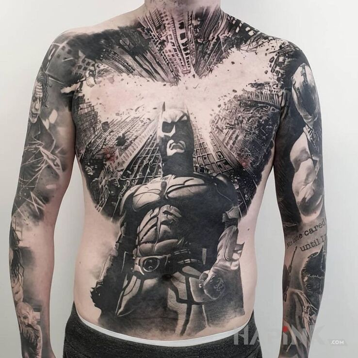 Tattoo Mroczny rycerz w swoim mieście in black and gray motif and realistic style On the arm