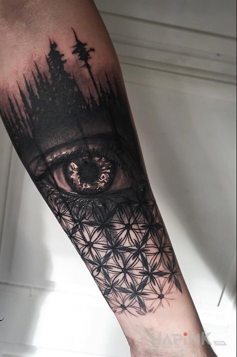 Tattoo Oko in geometric style on the forearm
