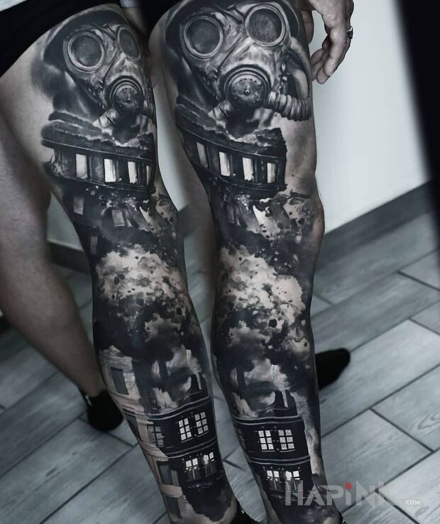 Tattoo Bomby spadające na miasto in war motif and realistic style on the thigh