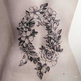 Tattoo Garland on the back on the back motif: flowers