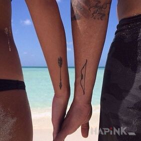 Tattoo Arrow and bow on the forearm motif: Love