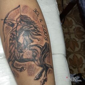 Tattoo Sagittarius on the calf motif: zodiac signs style: graphic / illustrative