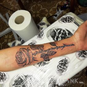 Tattoo Rose on the forearm motif: flowers style: graphic / illustrative