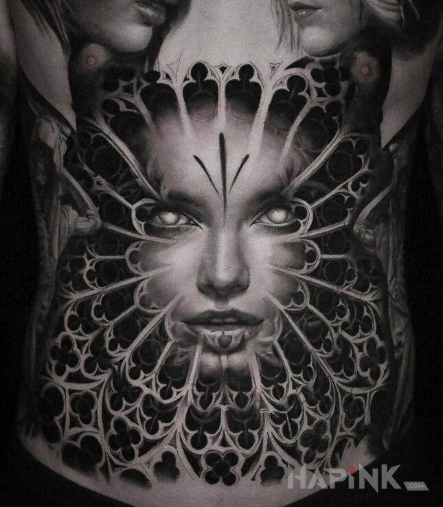 Tattoo Twarz w witrazu in black and gray motif and realistic style on the stomach