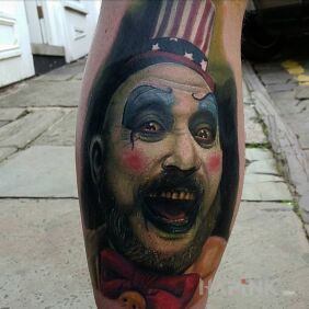 Tattoo Crazy clown on the calf motif: characters