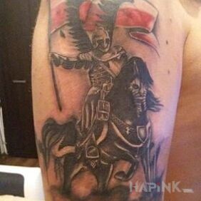 Tattoo Hussar on the upper arm motif: patriotic