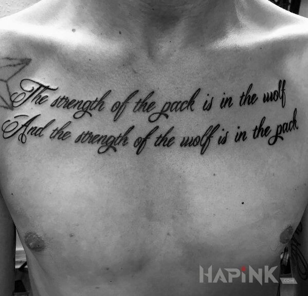 Tattoo Siła wilka! in lettering motif and calligraphy style on the chest