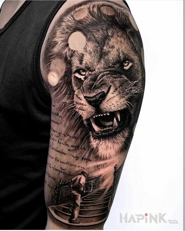 Tattoo Droga do bycia walecznym in black and gray motif and realistic style on the upper arm
