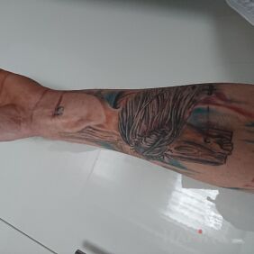 Tattoo It's on the forearm motif: religious