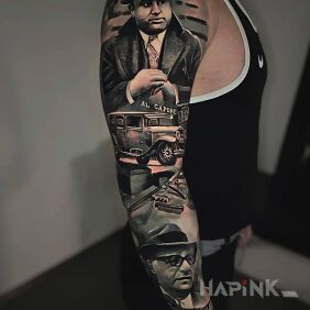 Tattoo La mafia On the arm motif: black and gray style: realistic