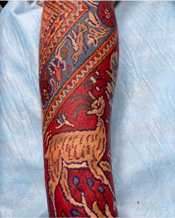 Tattoo Haftowane cudo in colorful motif and embroidered style on the forearm