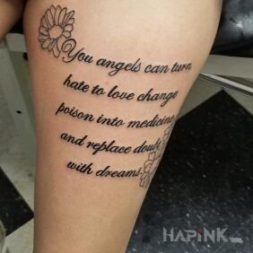 Tattoo You angels on the leg motif: lettering style: calligraphy