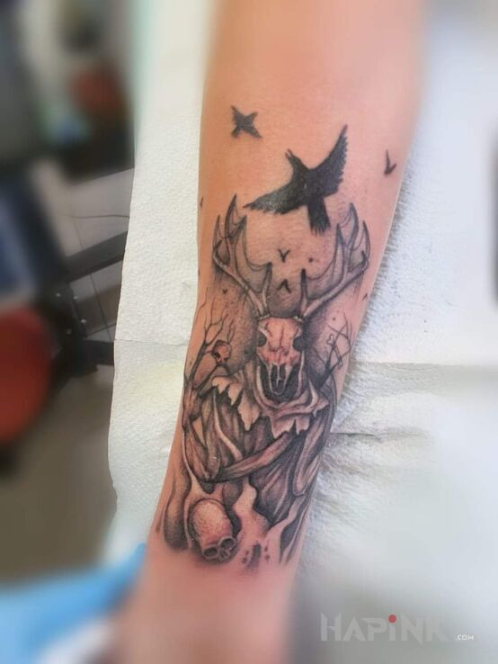 Tattoo Leszy in demons motif and graphic / illustrative style on the forearm