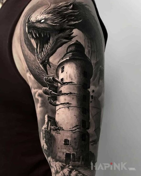 Tattoo Smok z wieży in black and gray motif and realistic style on the upper arm