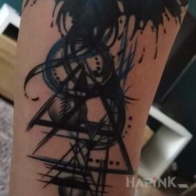 Tattoo Phoenix on the forearm motif: fantasy style: geometric